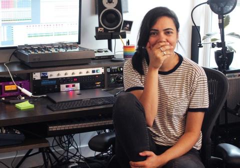 sarah tudzin at her home studio desk