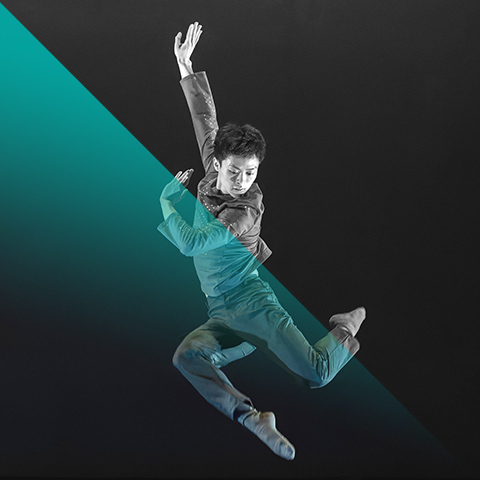 a dancer jumps mid air 