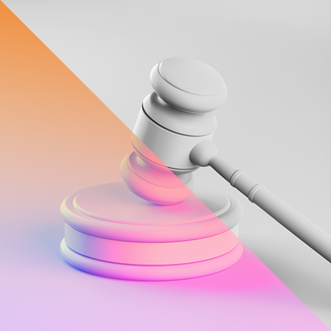 a gavel with a pink background 