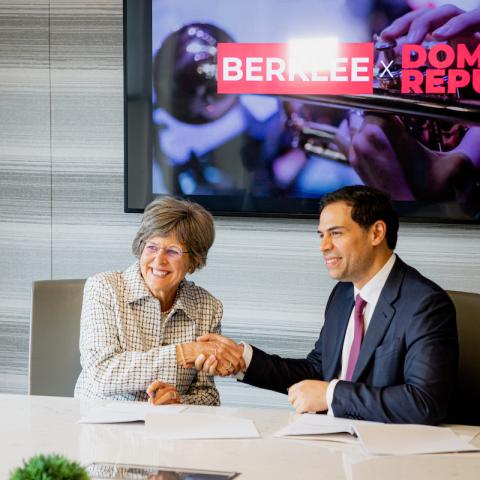 Berklee Online CEO and Cofounder Debbie Cavalier (left) and the Dominican Republic’s Minister of Culture Roberto Ángel Salcedo (right) shake hands