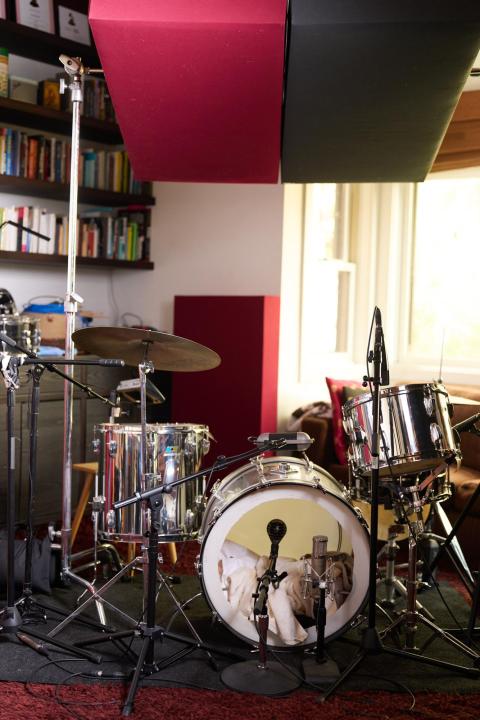 acoustic panels over a drum kit