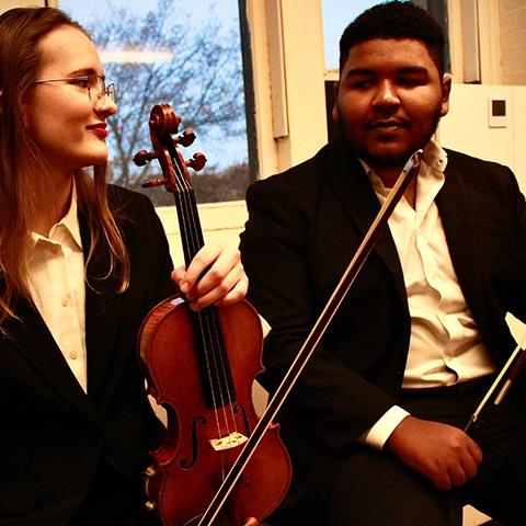 photo of Lauren Oeser (left) and Alex Estrella (right)