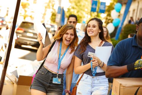 Students excitedly moving in for the semester