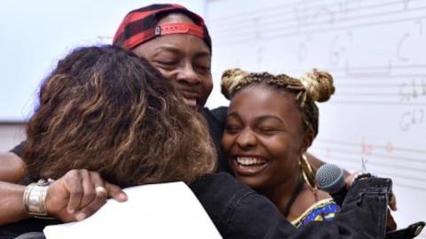 BSI students hugging