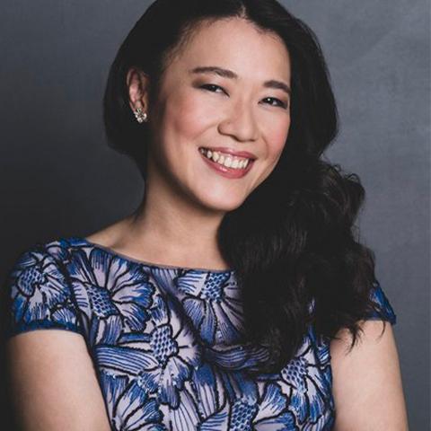 Pianist Charlotte Hu smiles for the camera 