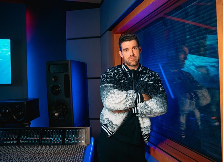 Lewis Pickett BM ’09 in a recording studio