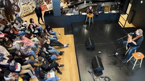 Gary Burr performs for students in Nashville 