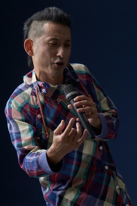 Lee Abe with microphone