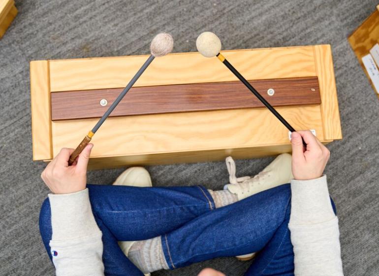 child in music class