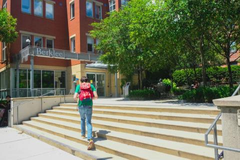 Student walking into 7 Haviland St.