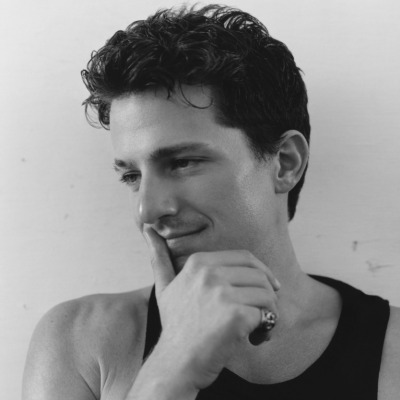 Charlie puth in black tank top - black and white headshot