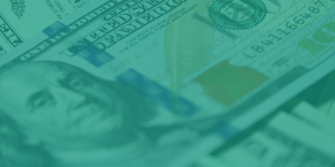 Abstract photo of pile of bill with an aqua tinted layer over it