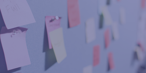 Multi-colored post-its on a wall