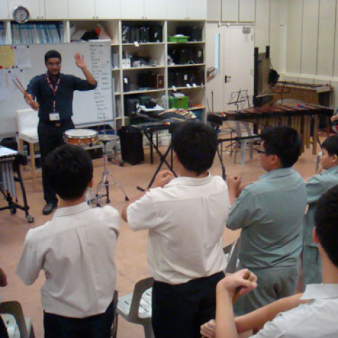 Man in the front of a classroom