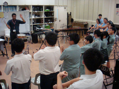Man in the front of a classroom