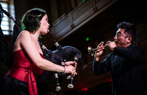 Musical duo playing bagpipe and trumpet