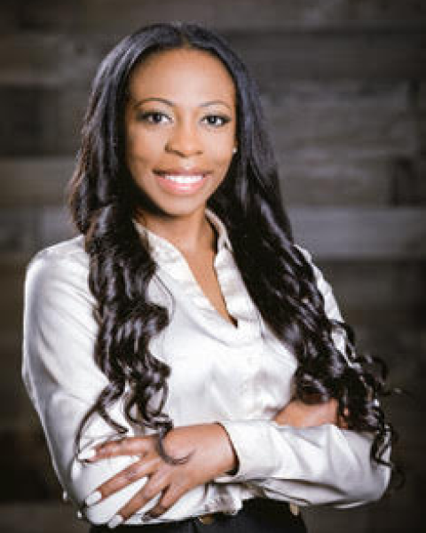 Headshot of Candice Carrington.